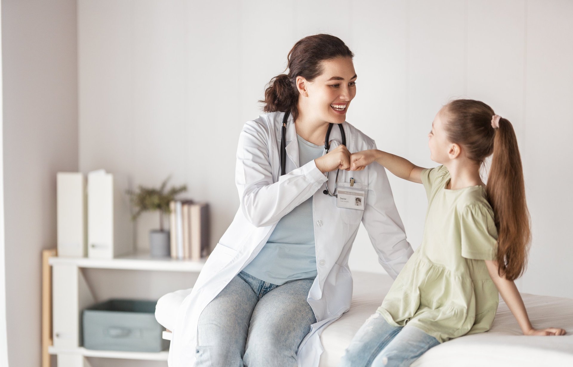 Girl patient listening to a doctor in medical office