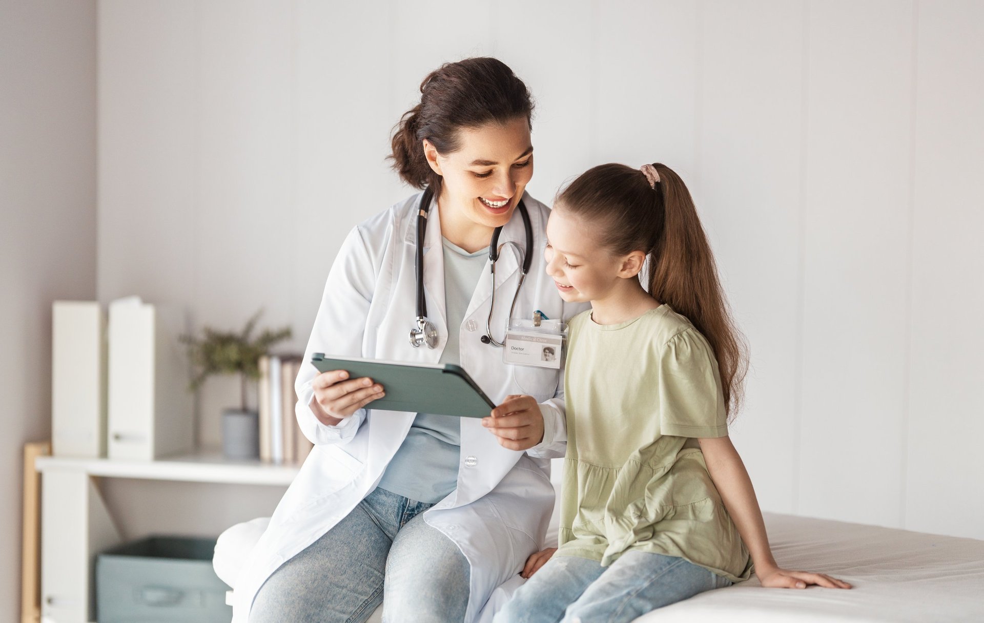 Girl patient listening to doctor during medical appointment